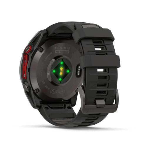 Fenix 8 спортен смарт часовник с черен дизайн и зелени светлини.