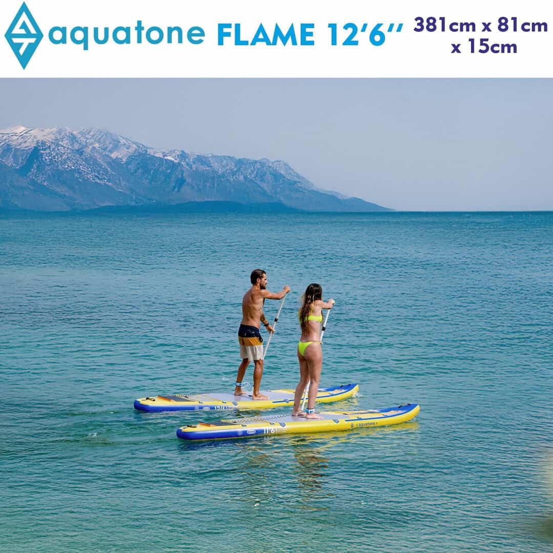 Двама души на SUP борд Aquatone Flame 12'6" на спокойна вода.